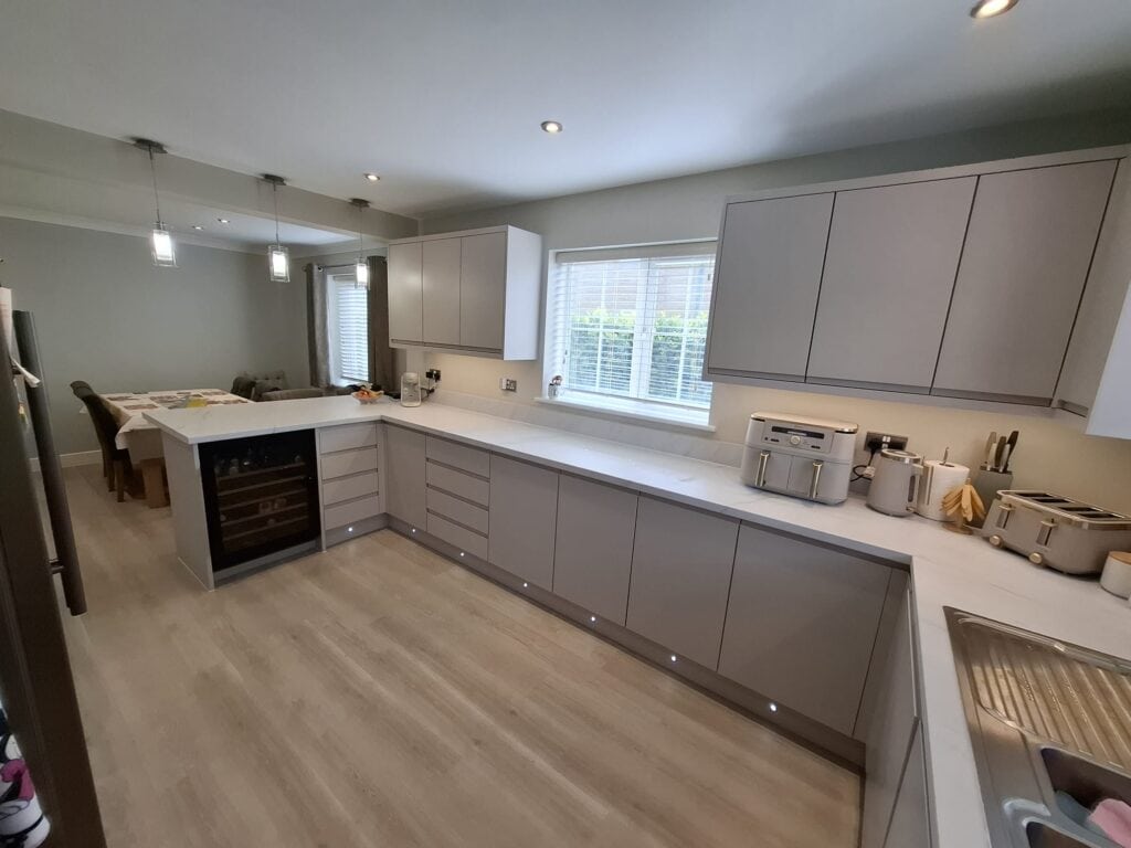 Modern kitchen with light grey cupboards Modern kitchen with light grey cupboards