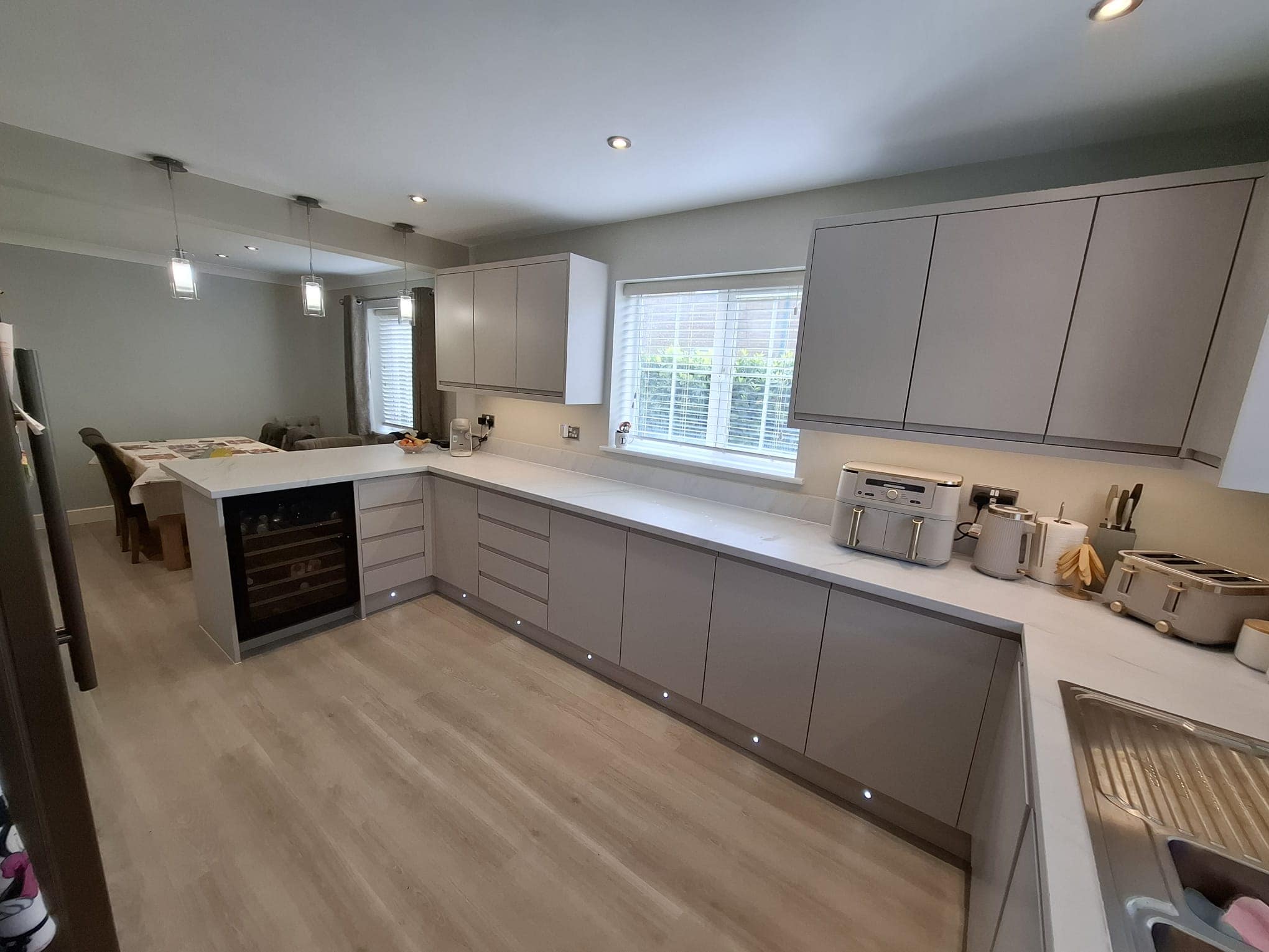Modern kitchen with light grey cupboards