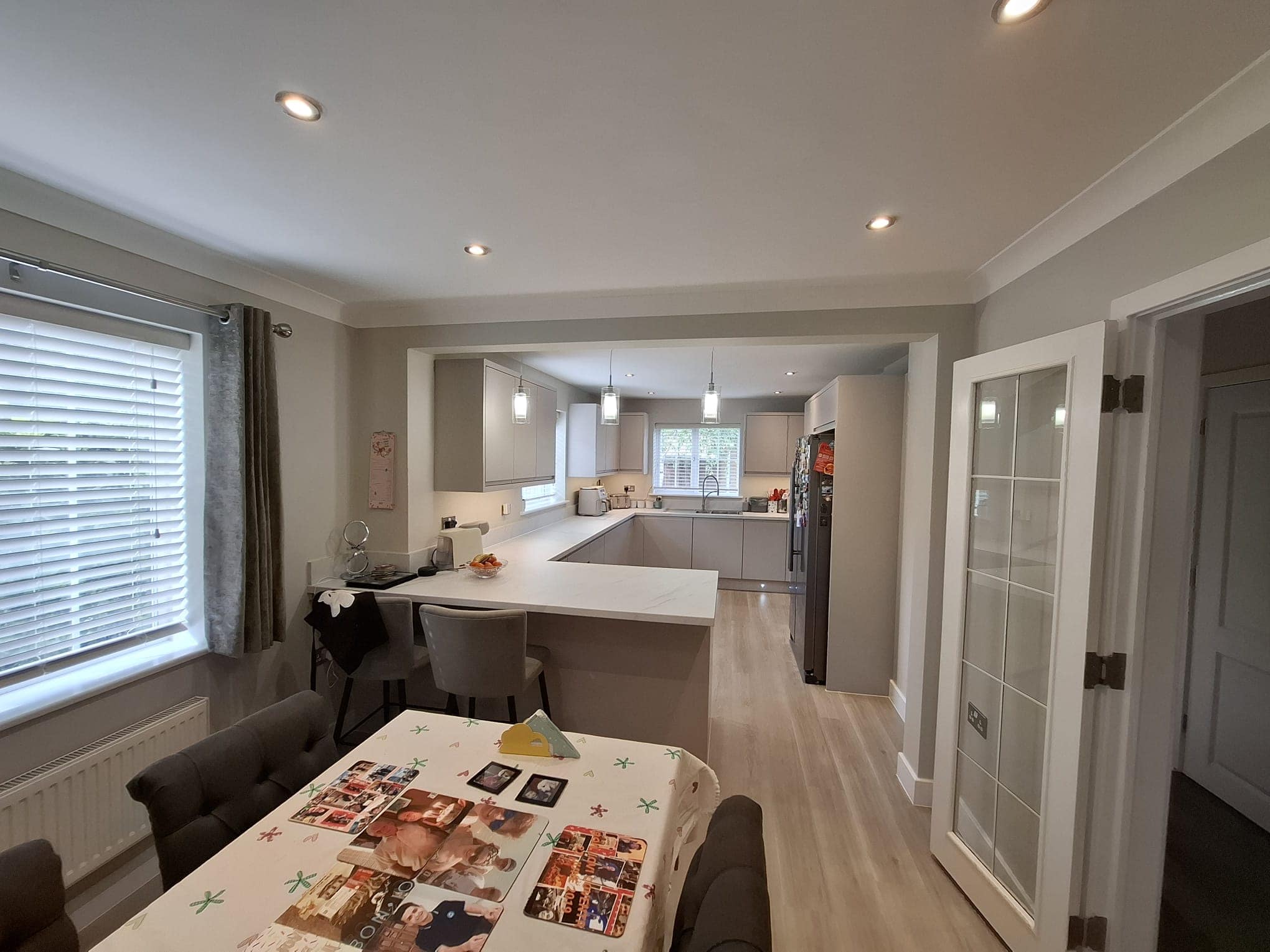 A modern kitchen and dining area