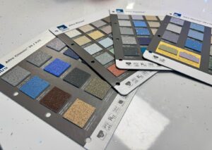 Four sample cards display various textured flooring swatches